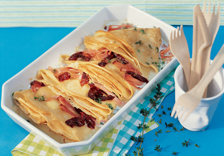 Crêpes gratinados de jamón y queso